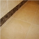 Crema Marfil Flooring with Dark Emperador