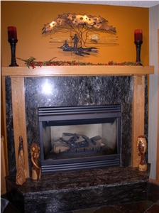 Cosmos Brown Granite Fireplace