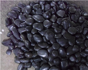 Polished and Waxing Black Pebbles, Black Pebbles