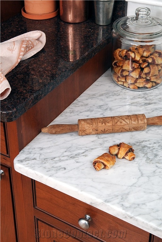 Bianco Carrara Unito C Marble Pastry Center, Dakota Crazy Horse Granite Countertops