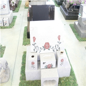 White Granite Tombstone with Engraved Flowers