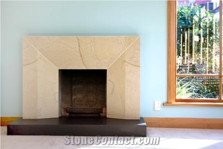 Hinuera Surround-Honed Absolute Black Hearth, Beige Limestone Fireplace