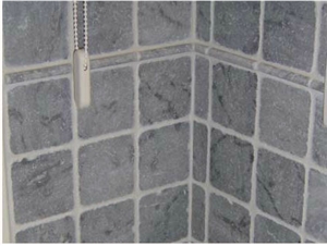 Tumbled Grey Marble Wall, Absolute Black Vanity to