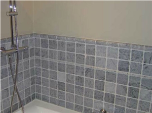 Tumbled Grey Marble Wall, Absolute Black Vanity to