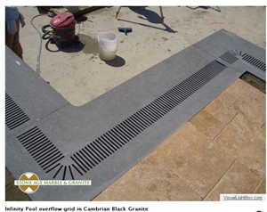 Infinity Pool Overflow Grid in Cambrian Black Granite Pool Coping