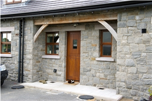 Grey Armagh Limestone with Brown Armagh Limestone Cills and Lintels