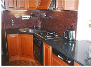 Sluknovsky Granite Countertop and Eagle Red Granite Backsplash