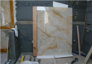 Peach & Apache Gold Onyx Bathroom Design