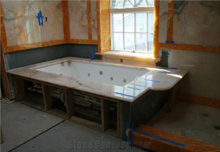 Peach & Apache Gold Onyx Bathroom Design