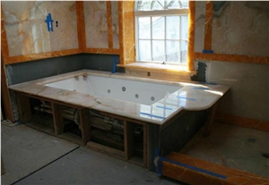 Peach & Apache Gold Onyx Bathroom Design
