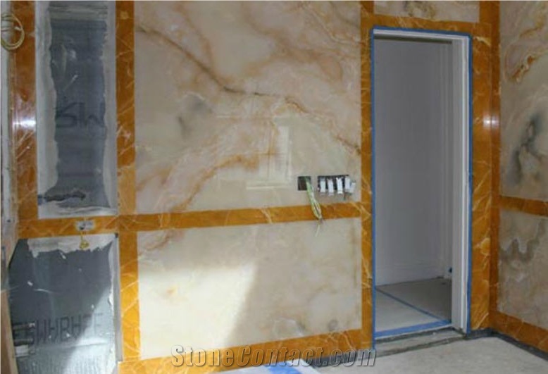 Peach & Apache Gold Onyx Bathroom Design