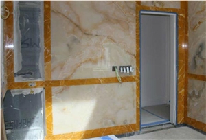 Peach & Apache Gold Onyx Bathroom Design