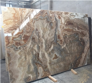 Cloudy Chocolate Onyx Slabs & Tiles