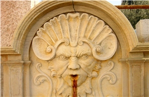 Atlantide Limestone Carved Wall Mounted Fountain, Giallo Dorato Yellow Limestone Wall Mounted Fountains