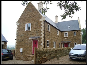 Limestone Corbel Contrasting Nicely with an Ironstone Wall