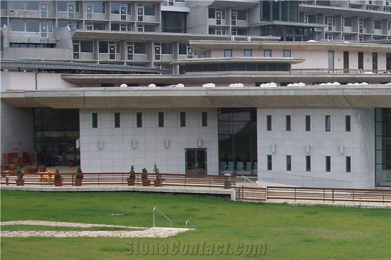 Rosa Beta Granite and Kanfanar Limestone Facade