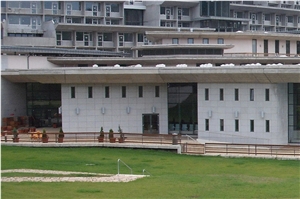 Rosa Beta Granite and Kanfanar Limestone Facade