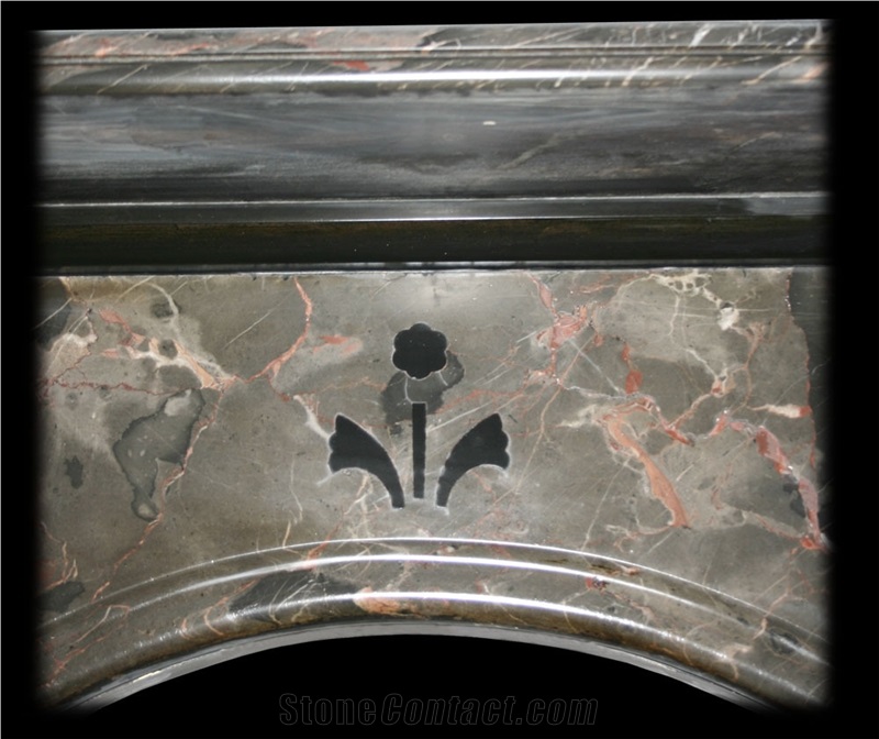 Antique Ashburton Marble Fire Surround with an Arched Aperture