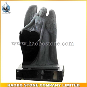 China Factory Handcarved Winged Angel Headstone for Sale, Black Granite Angel Hold the Heart Monuments and Tombstones