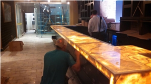 Speakeasy Bar in Honey Gold Onyx with Backlighting Panels