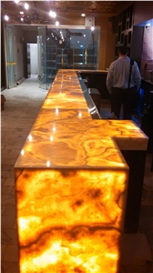 Speakeasy Bar in Honey Gold Onyx with Backlighting Panels