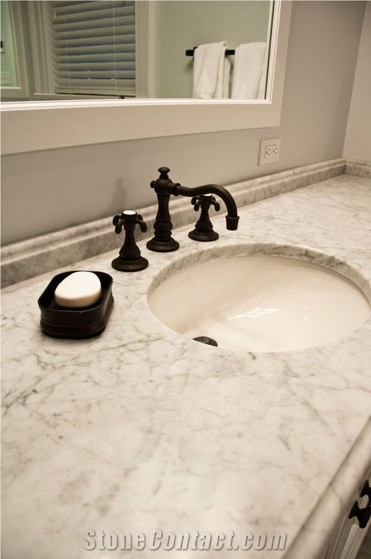 Stunning Bathroom Done in White Carrara Marble