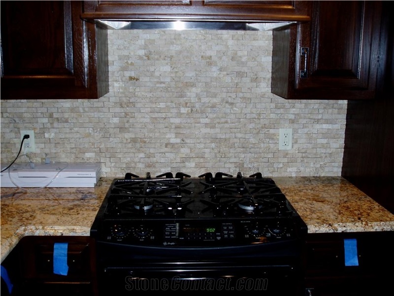 Brazil Juparana Golden Wave Granite Countertop and Navona Travertine Split Backsplash