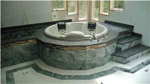 Grigio Perla Marble Tub with Meteorus Granite Deck and Steps
