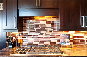 Orion Granite Counters with a Large Format Porcelain Tile Backsplash