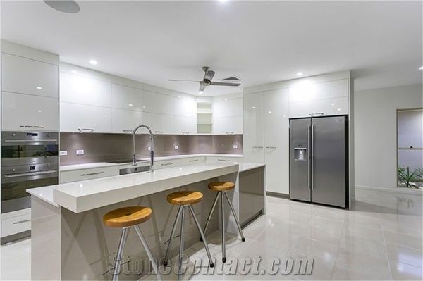 China Elegant White Quartz Stone Countertop with Bright Solid Surface Directly from China Manufacturer at Competitive Pricing Standard Slab Size 3200*1600mm or 3000*1400mm Thickness 12/15/20/25/30mm