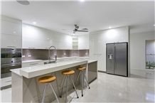 China Elegant White Quartz Stone Countertop with Bright Solid Surface Directly from China Manufacturer at Competitive Pricing Standard Slab Size 3200*1600mm or 3000*1400mm Thickness 12/15/20/25/30mm
