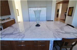 Blizzard Caesarstone Perimeter Counters, Statuary Polished Marble Island Counters
