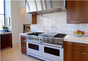 Blizzard Caesarstone Perimeter Counters, Statuary Polished Marble Island Counters