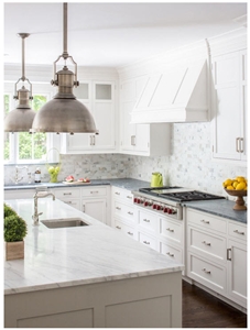 Perimeter is Classic Soapstone Counter and Calacatta Gold Marble Island Top