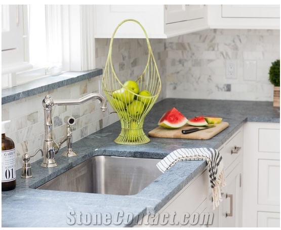Perimeter is Classic Soapstone Counter and Calacatta Gold Marble Island Top