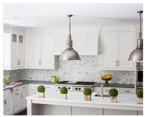 Perimeter is Classic Soapstone Counter and Calacatta Gold Marble Island Top