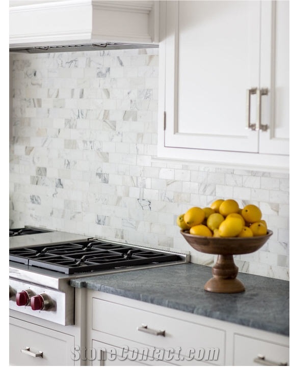 Perimeter is Classic Soapstone Counter and Calacatta Gold Marble Island Top