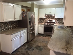 Backsplash, Granite Countertops and Slate Flooring