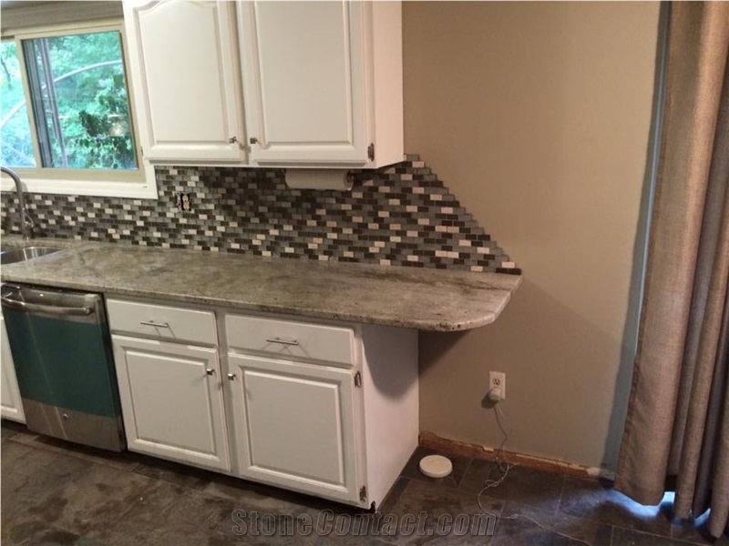 Backsplash, Granite Countertops and Slate Flooring