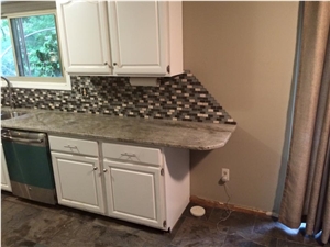 Backsplash, Granite Countertops and Slate Flooring