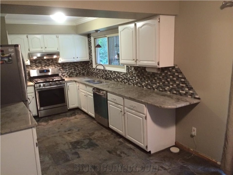 Backsplash, Granite Countertops and Slate Flooring