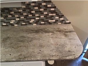Backsplash, Granite Countertops and Slate Flooring