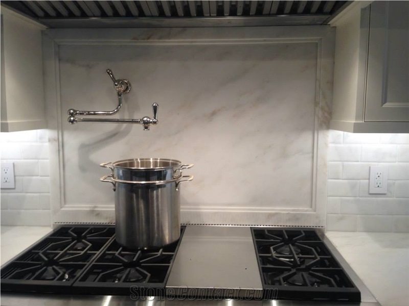 Imperial Danby Marble Countertops, with Full Height Slab Backsplash Behind Cooktop, Custom Rail Detail for Surrounding Edge