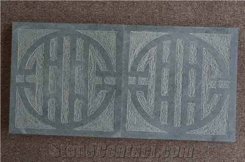 Mossy Green Stones with Logevous Word Pattern in Vietnam