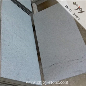 Sawn Blue Stone Tiles with Cat Paw