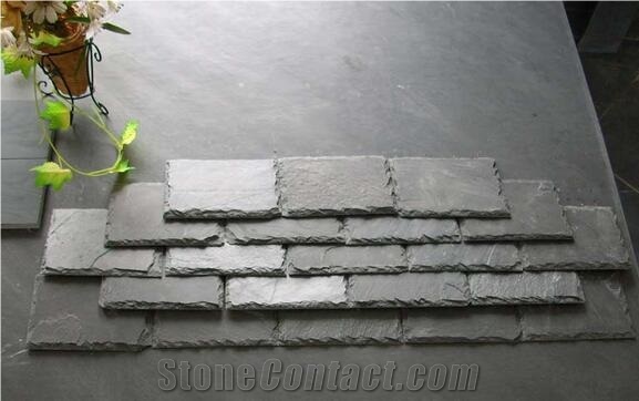 Black and Rusty Slate Roof Covering Tiles