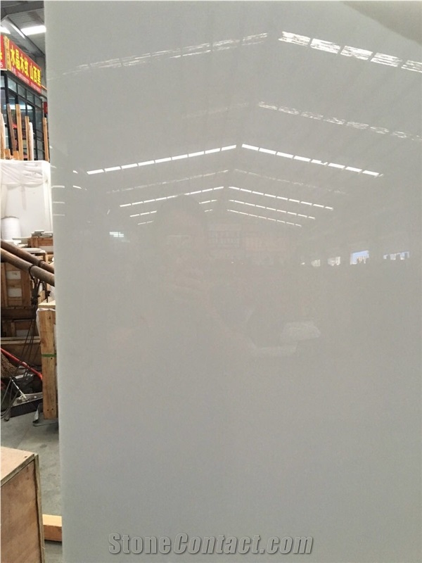High Quality China Super White Polished Nano Crystallized Glass Stone Slab & Tiles with Preeminent Material for Table Top in Usa and Canada Market