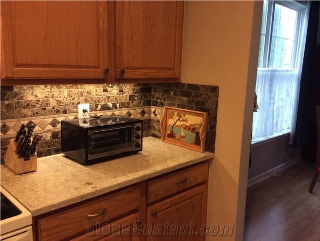 Quartz Chakra Beige Counter Top with Soho Studio Corps Stone Brushed Dark Emperador and a Custom Listello