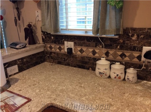 Quartz Chakra Beige Counter Top with Soho Studio Corps Stone Brushed Dark Emperador and a Custom Listello