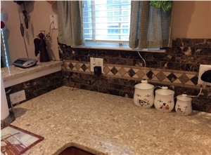 Quartz Chakra Beige Counter Top with Soho Studio Corps Stone Brushed Dark Emperador and a Custom Listello